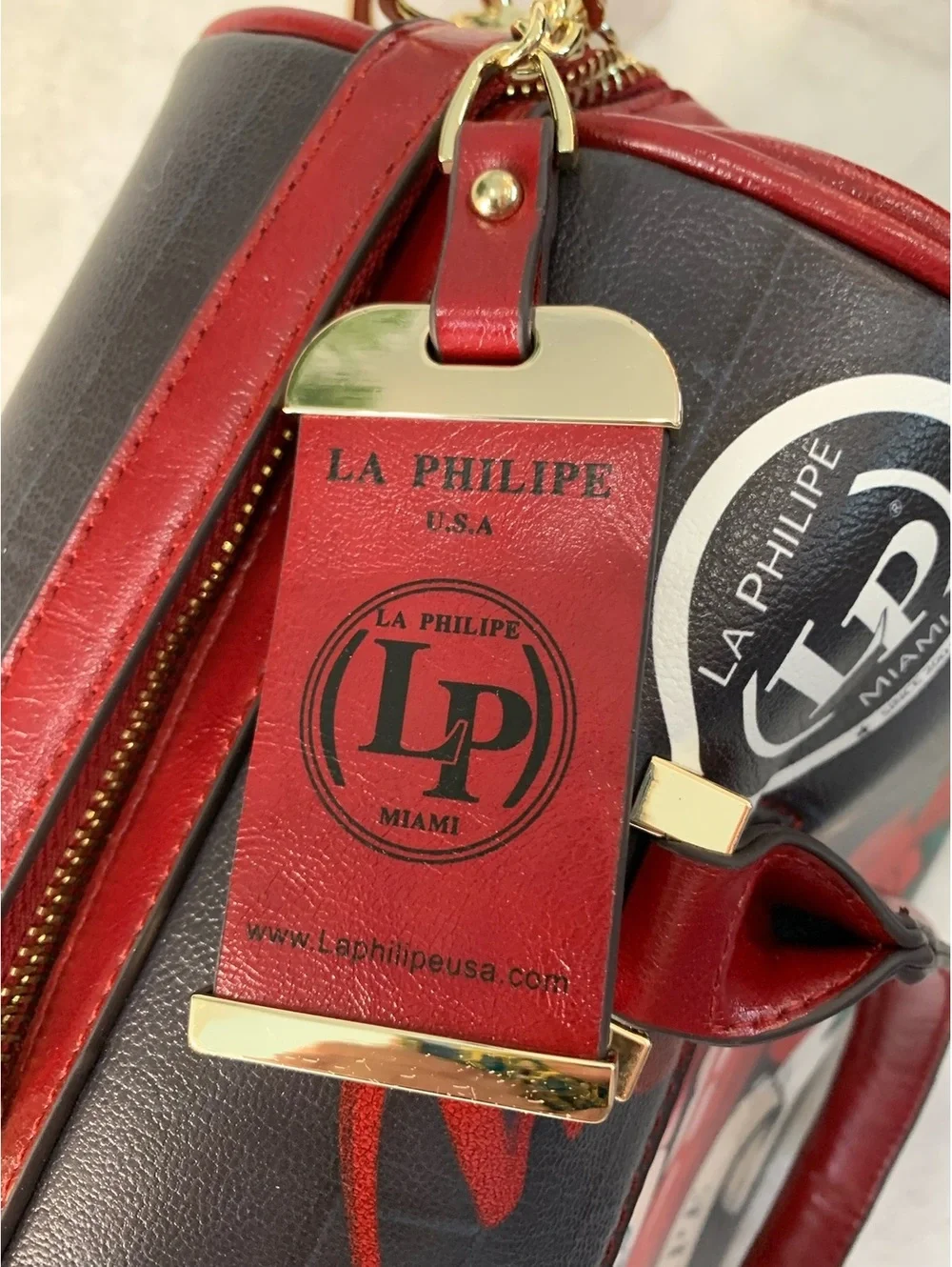La Philipe Miami Designer Handbag with Red Lip Print and Emb